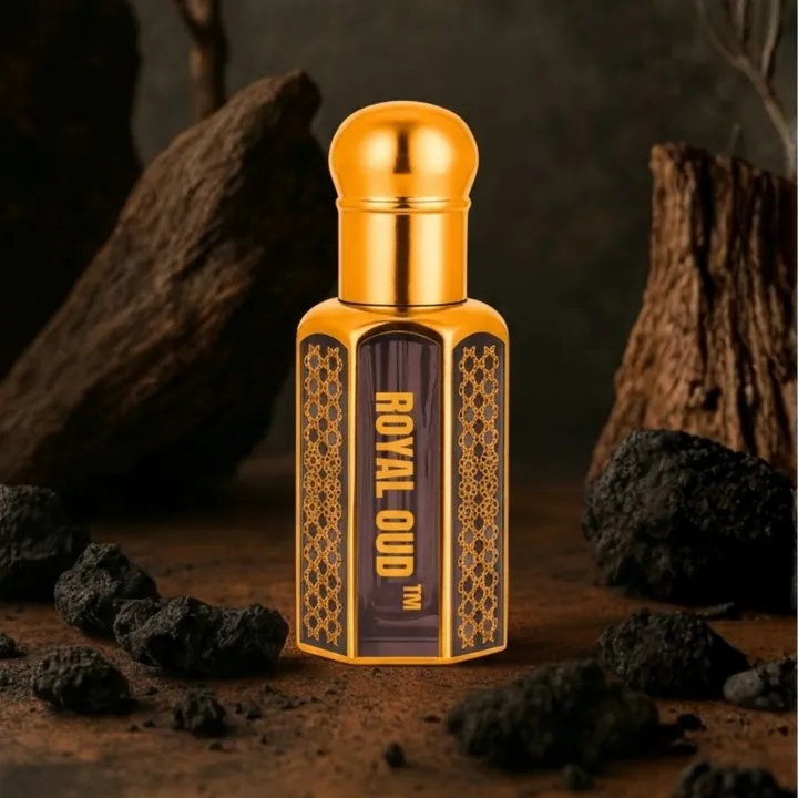 Royal Oud attar bottle set among oud wood pieces representing deep oriental fragrance